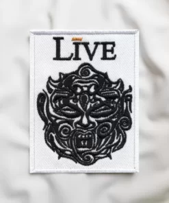 Limited Edition Live-Inspired Patch – Tribal Mask & Text Design (14cm x 10.8cm)